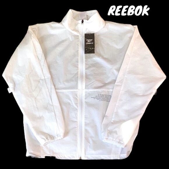 REEBOK NWT UNISEX LESMILLS TRACK  PERFORMANCE JACKET COAT ZIP UP WINDBREAKER SM - Picture 1 of 12